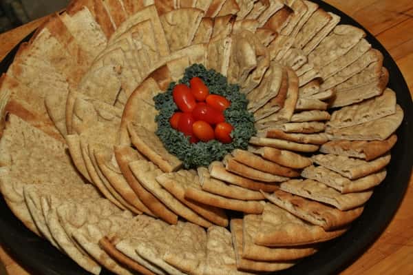 A platter filled with various cracker options