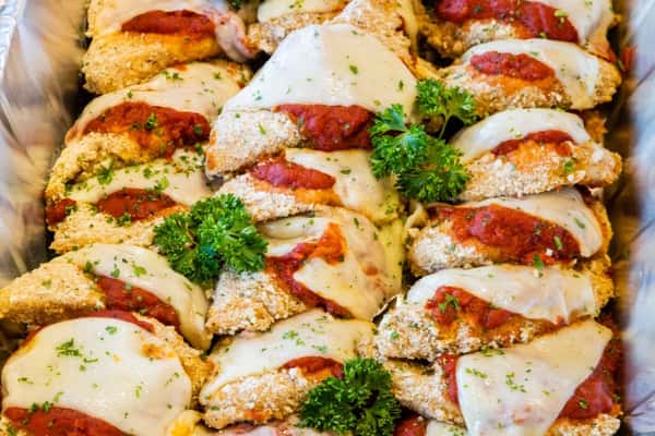 A tray of chicken parmesan