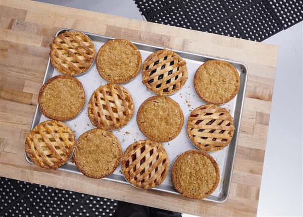 Assortment of baked pies on a tray