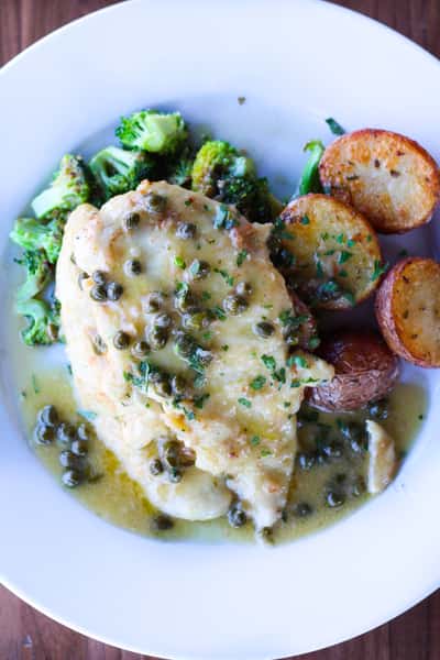 lemon caper white wine sauce, blistered tomatoes, roasted potatoes, brocolli, shaved parmesan