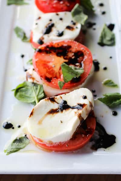 local mozzarella, fresh tomatoes, basil + evo