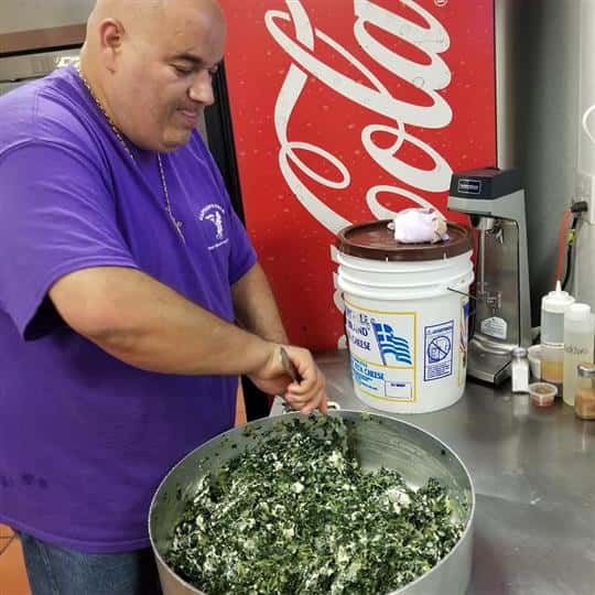 male employee preparing food
