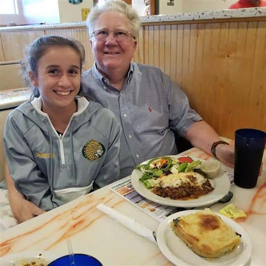male and female smiling for picture