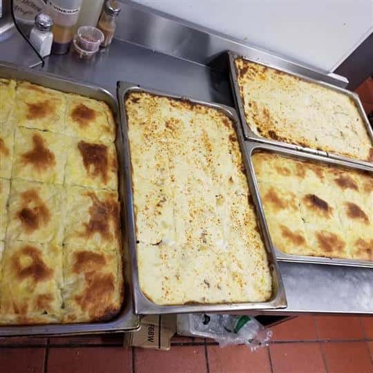 several trays of food