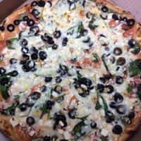 pizza with cheese and black olives