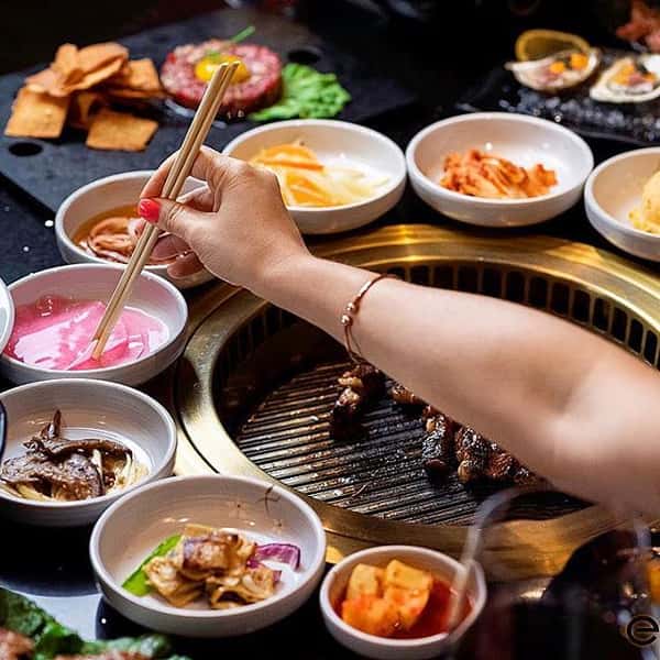 hand with chopsticks