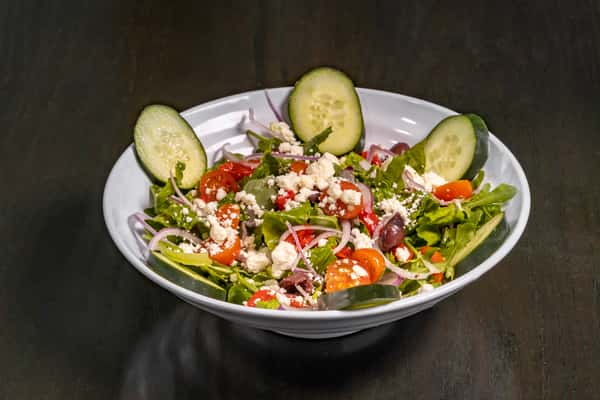 Salad with cucumbers, feta, and tomatoes