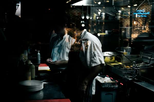 Chefs cooking at night