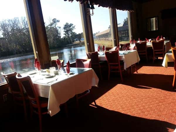 Picture of empty tables with a view of lake at chestnut dining
