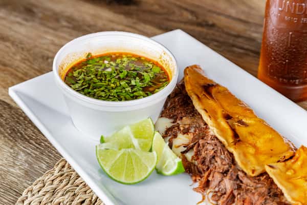 Machete birria with consomme