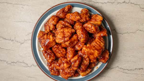 BBQ glazed boneless chicken wings served with ranch dipping sauce.