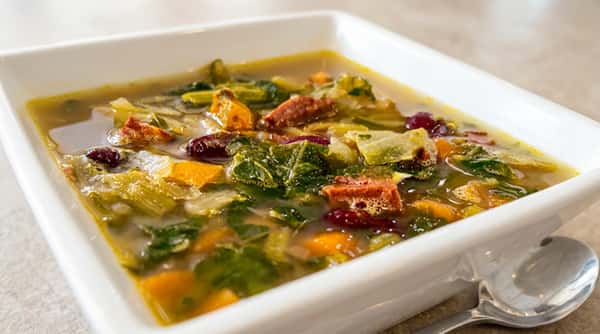 Homemade ham and vegetable soup with fresh greens and hearty broth at Roger's Family Restaurant in Somerset MA