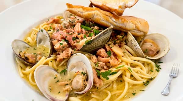 Clam linguine pasta with fresh clams, herbs, and garlic butter sauce at Roger's Family Restaurant in Somerset MA