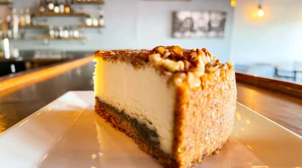 Caramel pecan cheesecake topped with crunchy pecans at Roger's Family Restaurant in Somerset MA