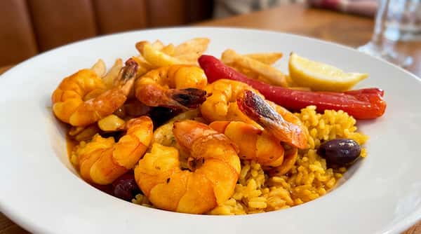 Seafood paella with shrimp, rice, sausage, and peppers at Roger's Family Restaurant in Somerset MA