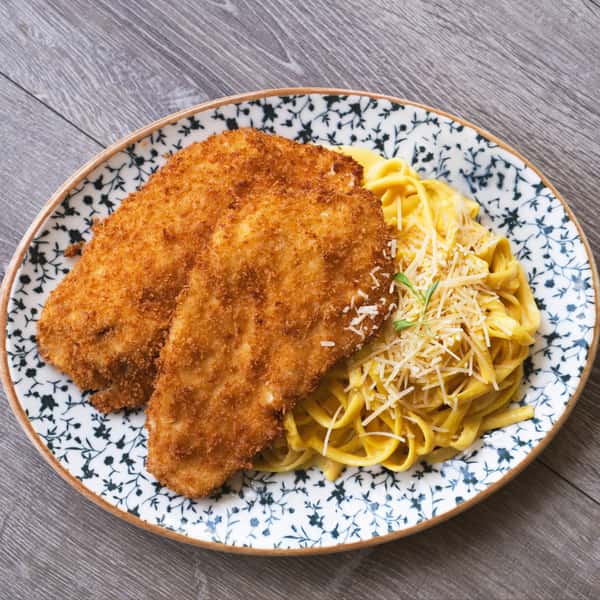 FETTUCCINE HUANCAÍNA CON MILANESA DE POLLO + DRINK
