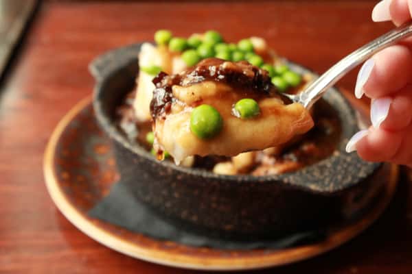 ground lamb, mashed potatoes, demi glaze, peas