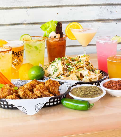 wings, nachos, with cocktail beverages