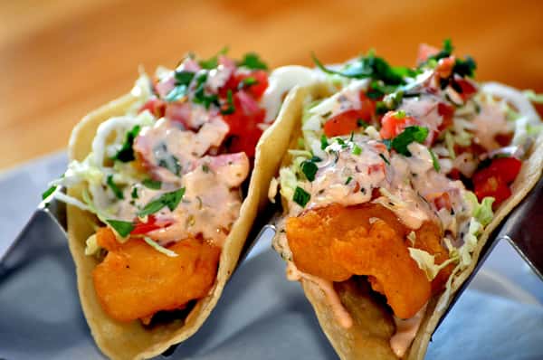Two Atlantic cod tacos in BBC's Marathon Blonde Ale batter, cabbage, pico de gallo, Baja sauce & corn tortillas. Add third taco for additional price.