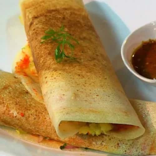 Spiced pancakes served with a sauce