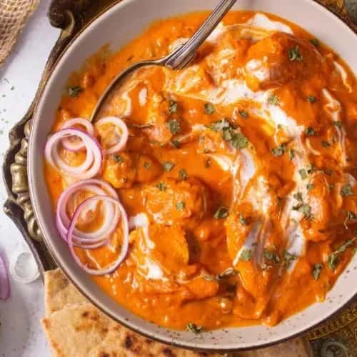 Savory chicken with sauce and onions