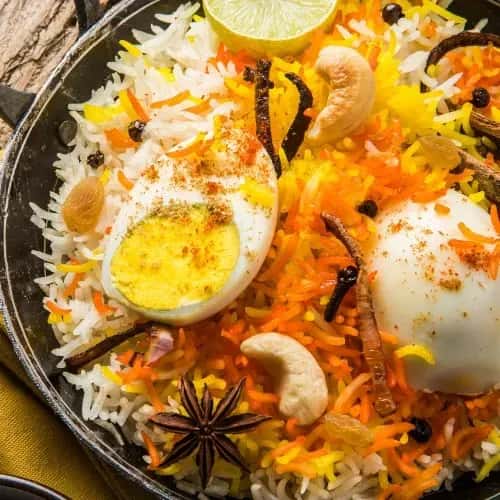 Boiled egg and cream sauce biryani