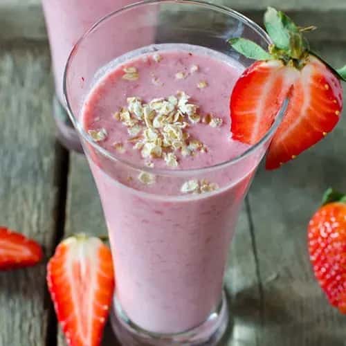Strawberry milkshake with strawberry slices