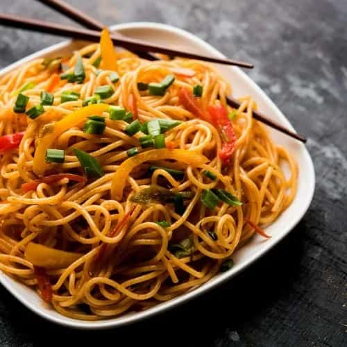 Spicy noodles with garnish