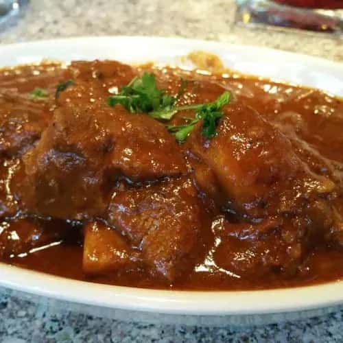 Mutton curry with herbs