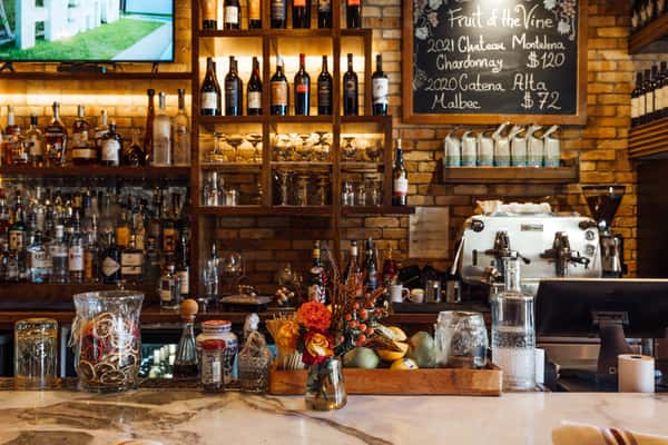 Bar area with a wine shelf