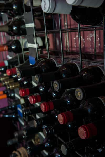 Wine bottles on a rack