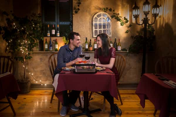 Couple dining together at Mona Lisa Fondue Restaurant