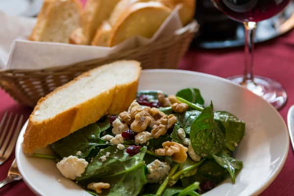 Salad with walnuts, cranberries, and cheese