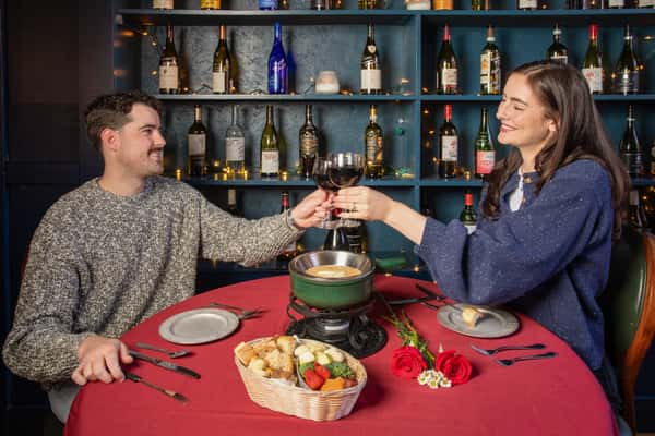 A romantic anniversary dinner in Manitou Springs featuring wine pairings and cheese fondue.