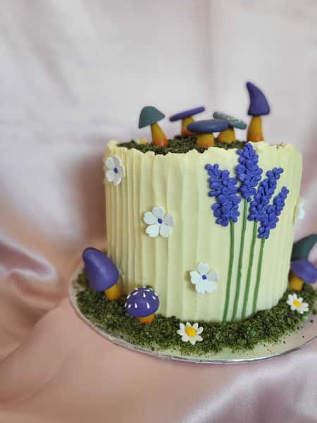 Cake with flowers and mushrooms