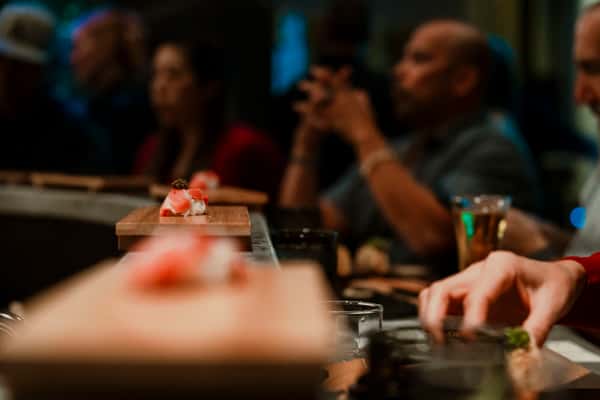 bokeh photo of a table with people