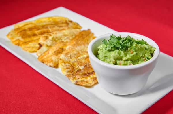 TOSTONES CON GUACAMOLE / FRIED GREEN PLANTAINS WITH GUACAMOLE