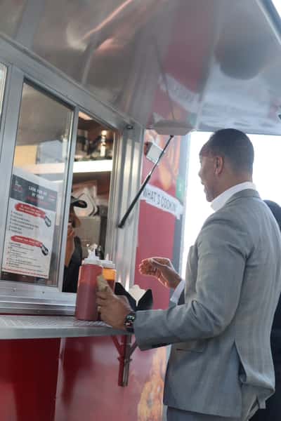 man receiving food