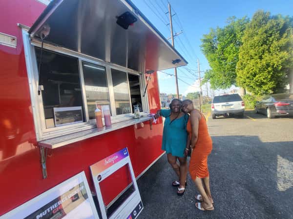customers waiting for food truck