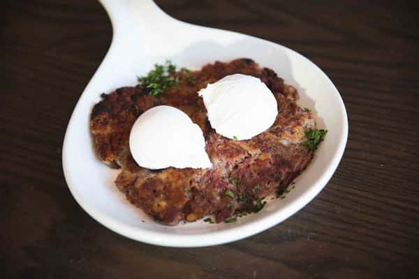 Housemade Corned Beef Hash with two eggs.