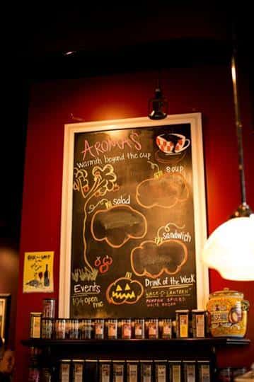 menu on chalkboard behind the counter