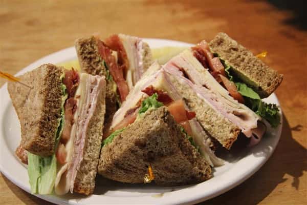sliced turkey club sandwiches