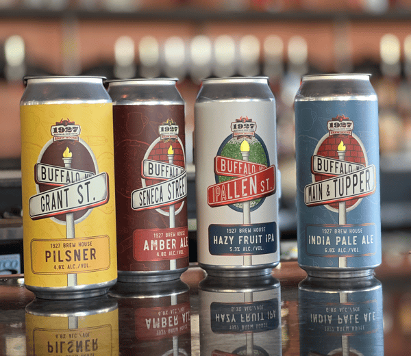 An assortment of our 1927 Brew House Beers. From left to right, our Grant St. Pilsner, our Seneca St. Amber Ale, our IPAllen IPA, and our Main & Tupper IPA.