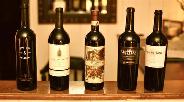 Three bottles of red wine.