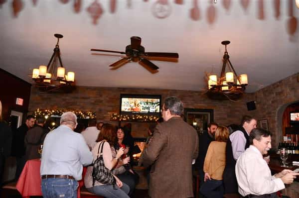 Inside of restaurant filled with customers.