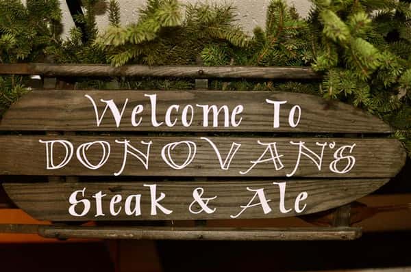 Welcome to Donovan's Steak & Ale sign outside.