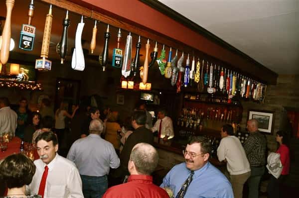 Inside of restaurant filled with customers.