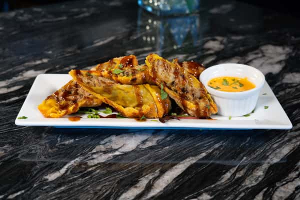 2 Jerk Chicken Egg Rolls