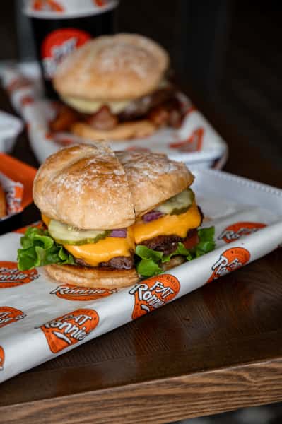 Burger meal with fries and dipping sauce