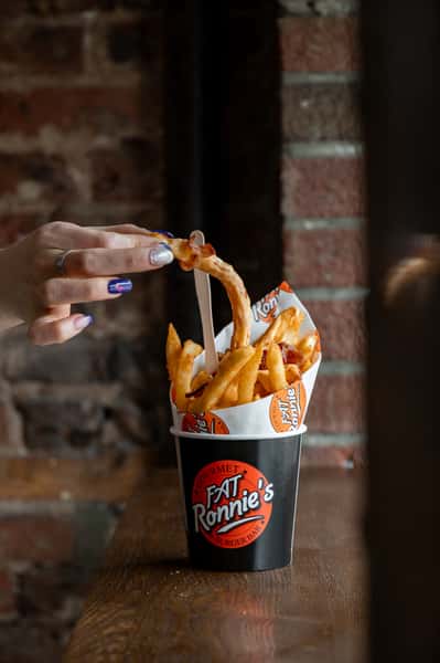 Fries and soft drink served together
